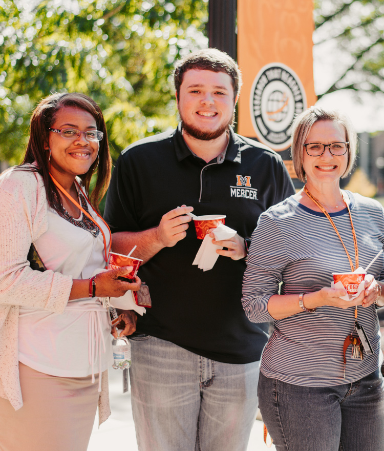 A group of mercer employees eating ice cream